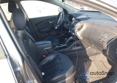 2013 Hyundai Tucson Limited z USA, uszkodzony, nr VIN KM8JU3AC2DU581403